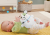 FISHER-PRICE Snuga Puppy przytulanka z melodiami i wibracjami SZCZENIAK 18 cm